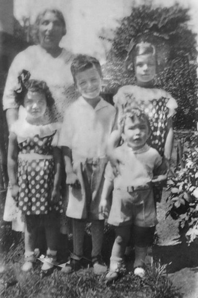 Shirley (furthest right), her siblings, and grandmother (Bubbe) Bella Levy